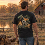 Old South Apparel Campfire Bandit short sleeve pocket tee in Black featuring a playful outdoor-inspired raccoon graphic.