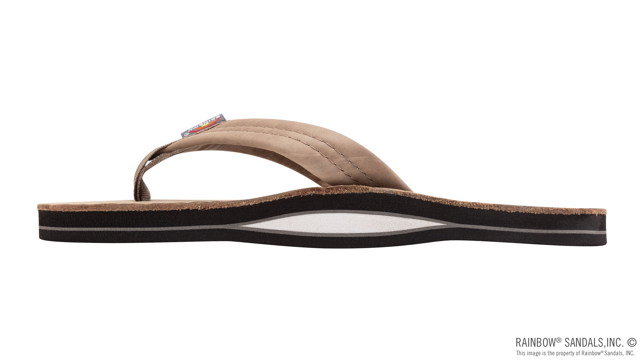Brown sandal with a white sole on a white background