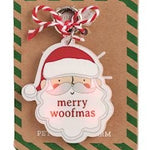 Six Christmas-themed enamel lapel pins displayed on their original backing cards against a white background. The designs include Santa Claus, a reindeer, a snowman, a Christmas tree, a Christmas paw print, and a Christmas bone.