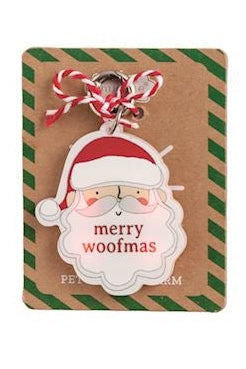Six Christmas-themed enamel lapel pins displayed on their original backing cards against a white background. The designs include Santa Claus, a reindeer, a snowman, a Christmas tree, a Christmas paw print, and a Christmas bone.
