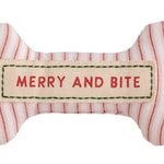 Set of six bone-shaped Christmas-themed dog toys with various sayings on a white background.