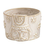 Four decorative ceramic pots with different patterns on a white background