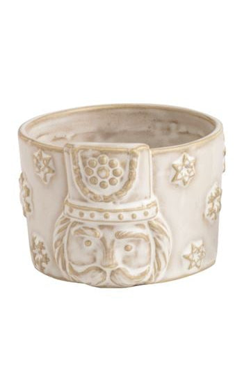 Four decorative ceramic pots with different patterns on a white background