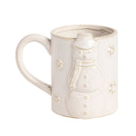 An off-white ceramic mug featuring a raised 3D snowman design on the side, accented with small gold glittery snowflakes, set against a plain white background.