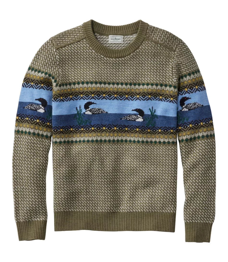 A long-sleeve crewneck knit sweater featuring a brown and olive base with a horizontal blue pattern band depicting loons and geometric accents.