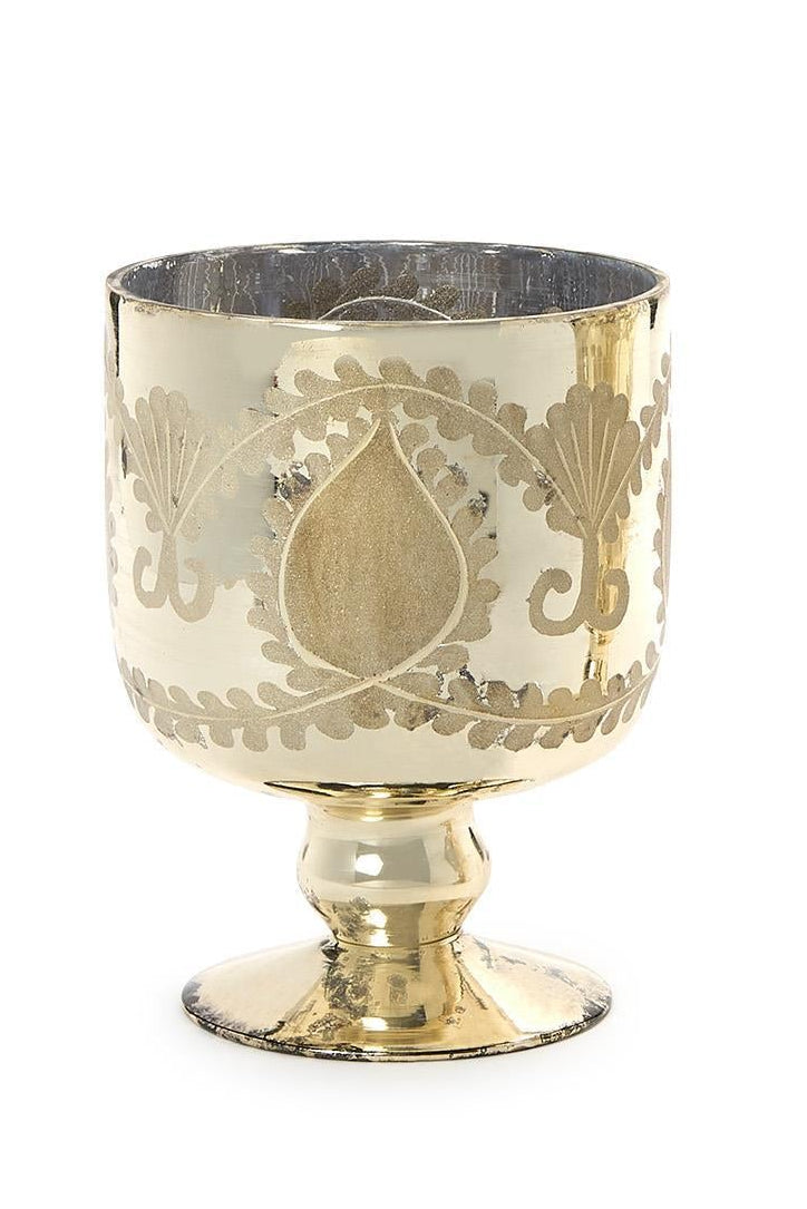 Two gold ornate goblets on a white background