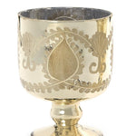 Two gold ornate goblets on a white background