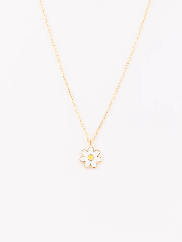 A delicate gold chain necklace featuring a small white daisy pendant with a yellow center, displayed against a clean white background.