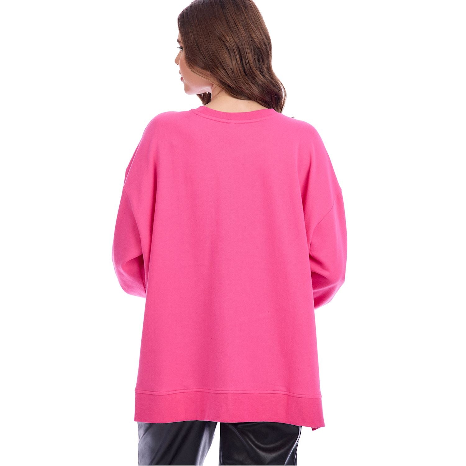 Person wearing a pink sweatshirt on a white background
