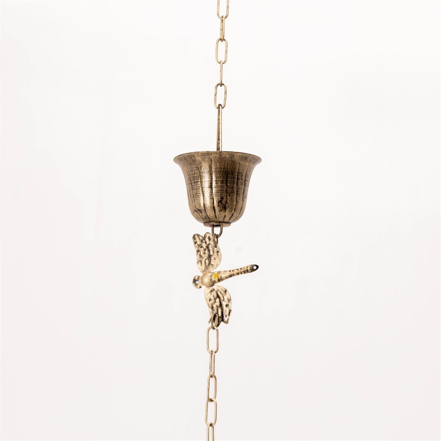 Eight-foot golden iron rain chain featuring decorative dragonflies, designed to guide rainwater while adding an elegant accent to porches and gardens.