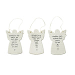 Three white ceramic angel ornaments with engraved text on a white background