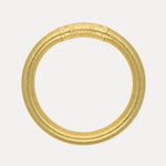 A gold-colored metal ring with a textured finish and a flat band engraved with the brand name 'Bercetelli' in script, shown against a plain light gray background.