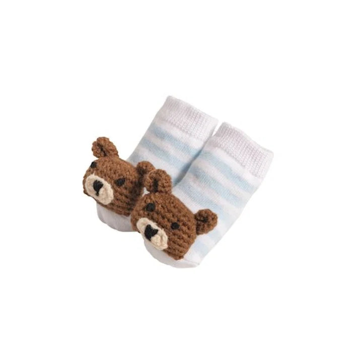 Pair of baby socks with bear design on a white background