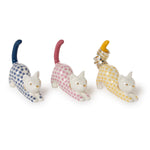 Three cat-shaped ceramic holders with patterned bodies on a white background