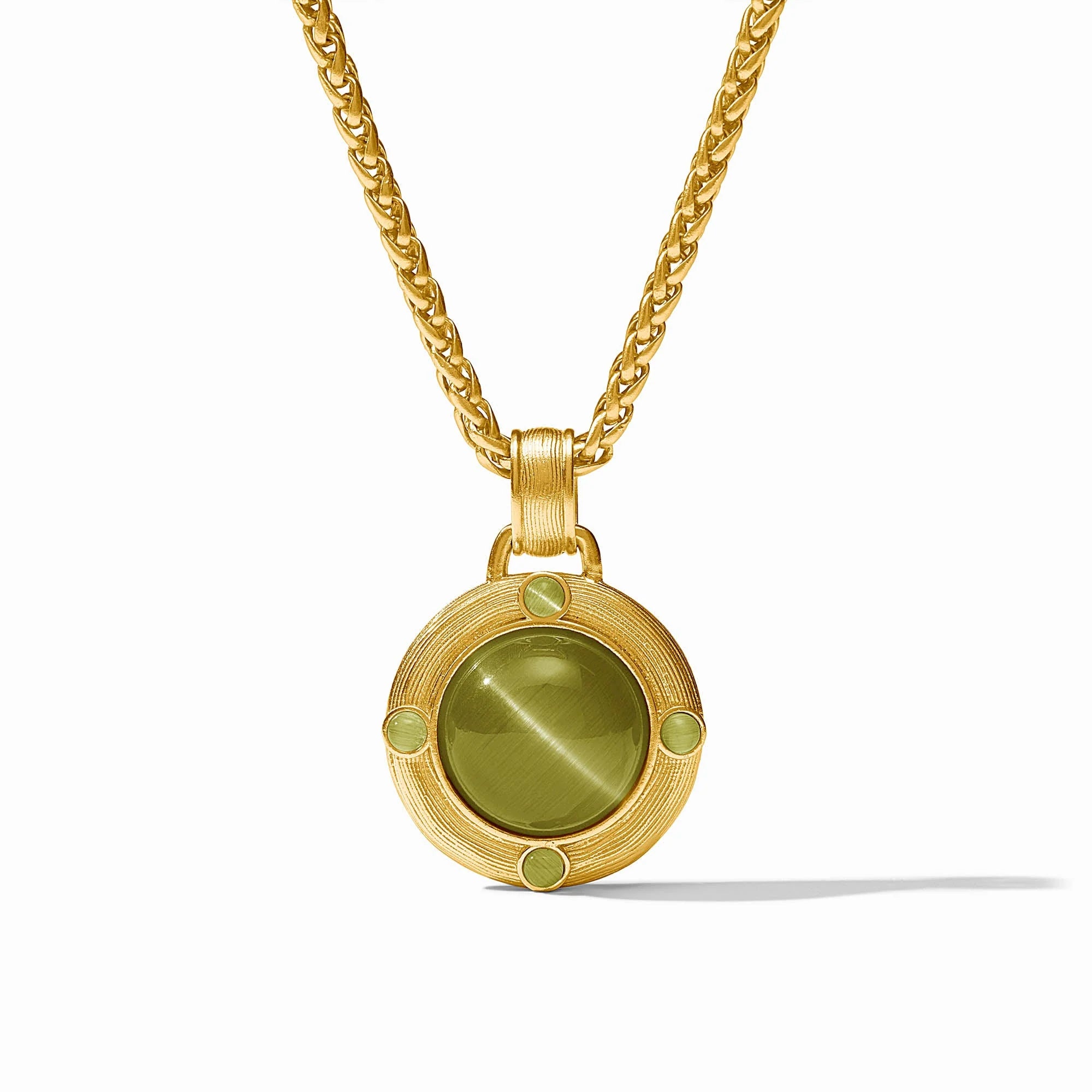 A gold pendant necklace featuring a round green stone centerpiece and four small green accent stones, suspended from a gold chain on a white background.