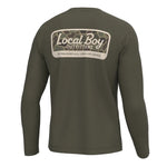 An olive green long-sleeve t-shirt shown from the back, featuring a large graphic print on the upper back with a camouflage pattern and the text 'Local Boy OUTFITTERS'.