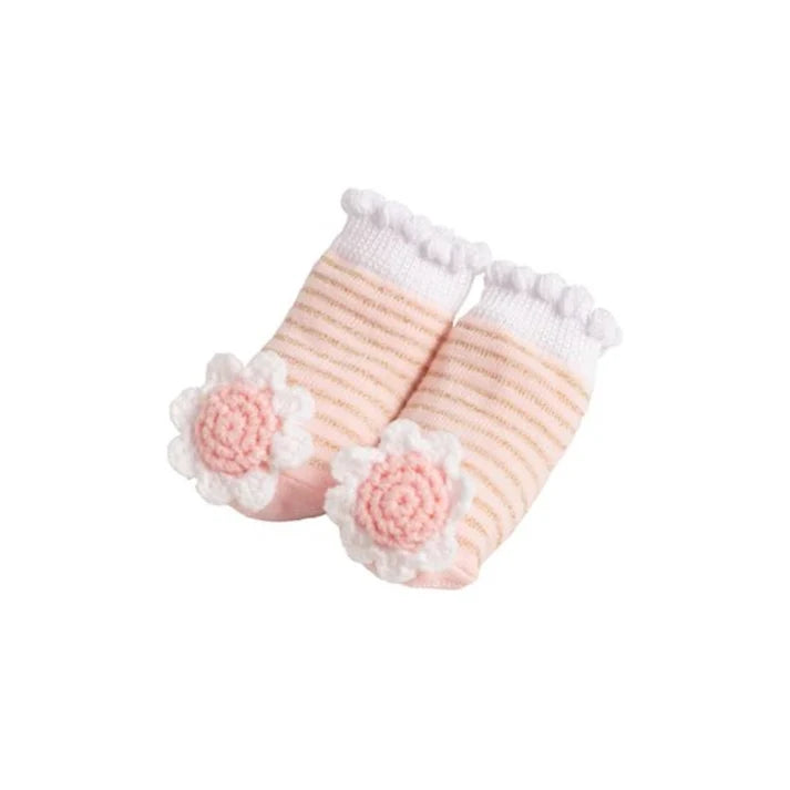 Pair of baby socks with floral design on a white background