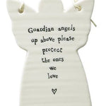 A white ceramic angel-shaped hanging ornament with black printed text that reads 'Guardian angels up above please protect the ones we love' and a small heart at the bottom, shown on a plain white background.