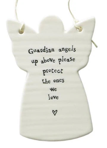 A white ceramic angel-shaped hanging ornament with black printed text that reads 'Guardian angels up above please protect the ones we love' and a small heart at the bottom, shown on a plain white background.