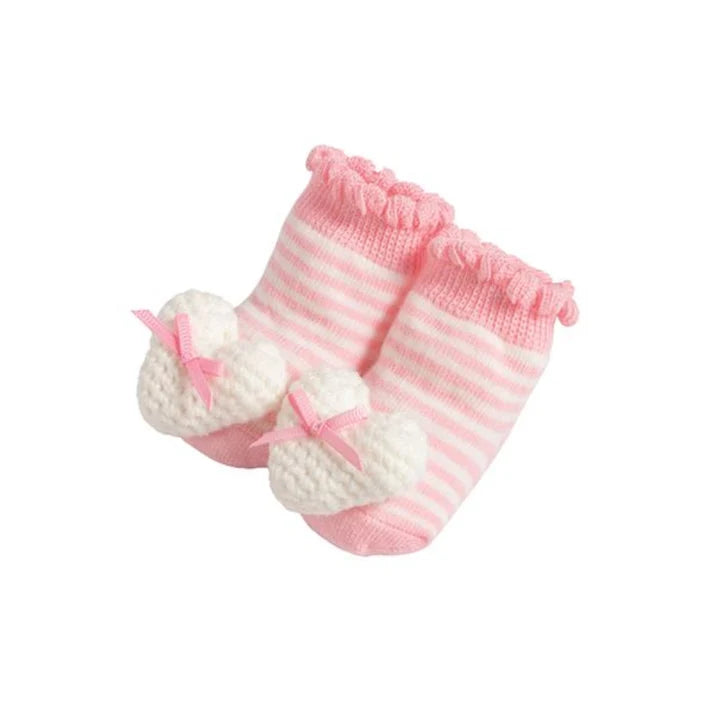 Pink and white striped knit baby booties with white heart-shaped toe covers and small pink bows, shown on a plain white background.