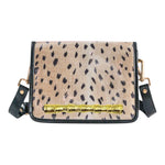 Dark antelope clear stadium crossbody bag featuring animal-print detailing, transparent construction, and a statement gold bamboo stick accent for game day.