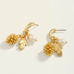 Spartina 449 Pine Forest Earrings featuring fall-inspired 24kt matte gold details with dangling freshwater pearls in a delicate drop silhouette.
