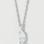 A silver-tone chain necklace with a marquise-cut clear gemstone pendant, shown against a light gray background.