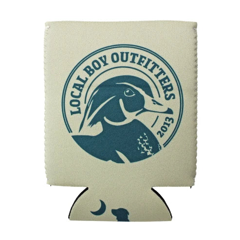 An off-white insulated can cooler sleeve featuring a dark teal circular duck graphic with the text 'LOCAL BOY OUTFITTERS 2013' and a small moon-and-dog print near the bottom, shown on a plain white background.