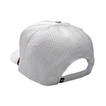 White perforated baseball cap shown from a rear three-quarter angle on a plain white background.