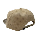 A tan baseball cap with a perforated fabric crown and a camouflage-patterned visor, shown from a three-quarters back angle on a white background.