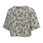 Camouflage-patterned shirt on a white background