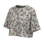 Camouflage-patterned poncho on a white background