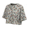 Camouflage-patterned poncho on a white background