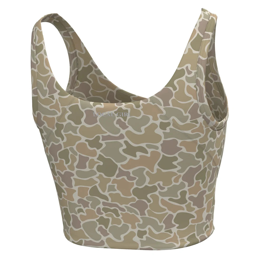 A scoop-neck tank top with a camouflage pattern in shades of beige, brown, and gray, featuring wide shoulder straps and a scoop neckline.