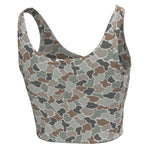 Pink sports bra with 'LOCAL GIRL' branding on a white background