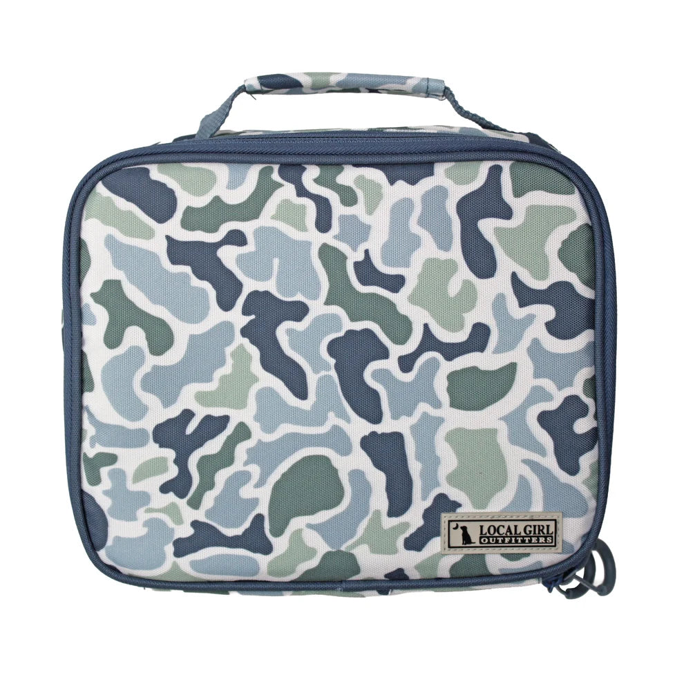A Local Girl Sweetheart insulated lunch bag featuring a blue, green, and white camouflage pattern, with a navy blue handle and trim.