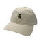 A beige baseball cap featuring a small dark green embroidered graphic of a sitting dog and a crescent moon on the front panel, shown against a plain white background.