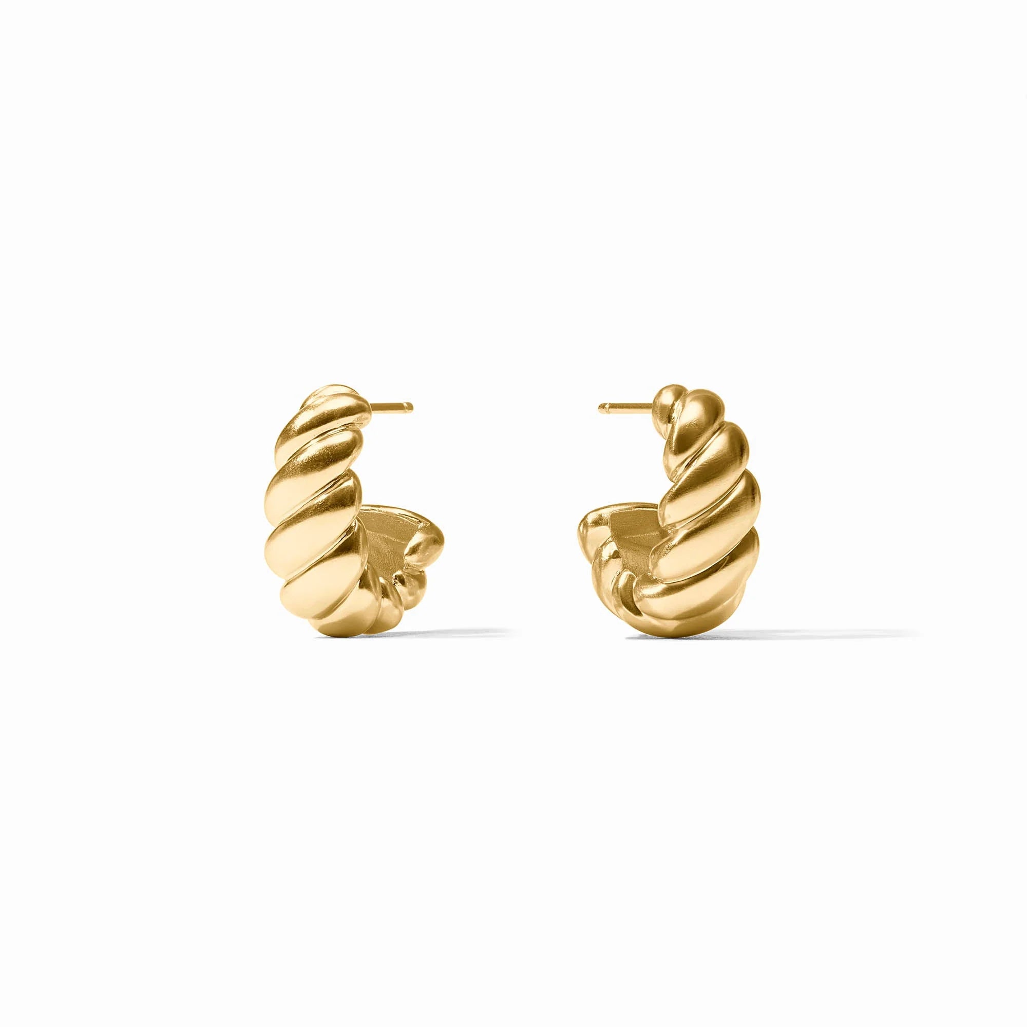 Pair of gold spiral earrings on a white background