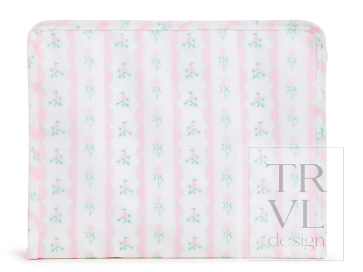 A rectangular padded cushion or pillow with a white background, vertical pink stripes, and small mint green floral motifs. A semi-transparent 'TRVL design' watermark is visible on the right side.