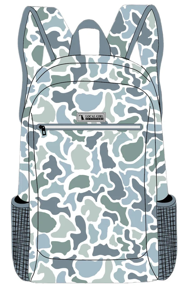 A backpack with a blue, green, and gray camouflage pattern, featuring a front zippered pocket and side mesh pockets, shown against a plain white background.