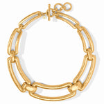 A chunky gold chain link necklace with a hammered texture and a toggle clasp, shown on a clean white background.