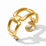 Gold cuff with a unique design on a white background
