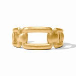 Gold cuff with a white background