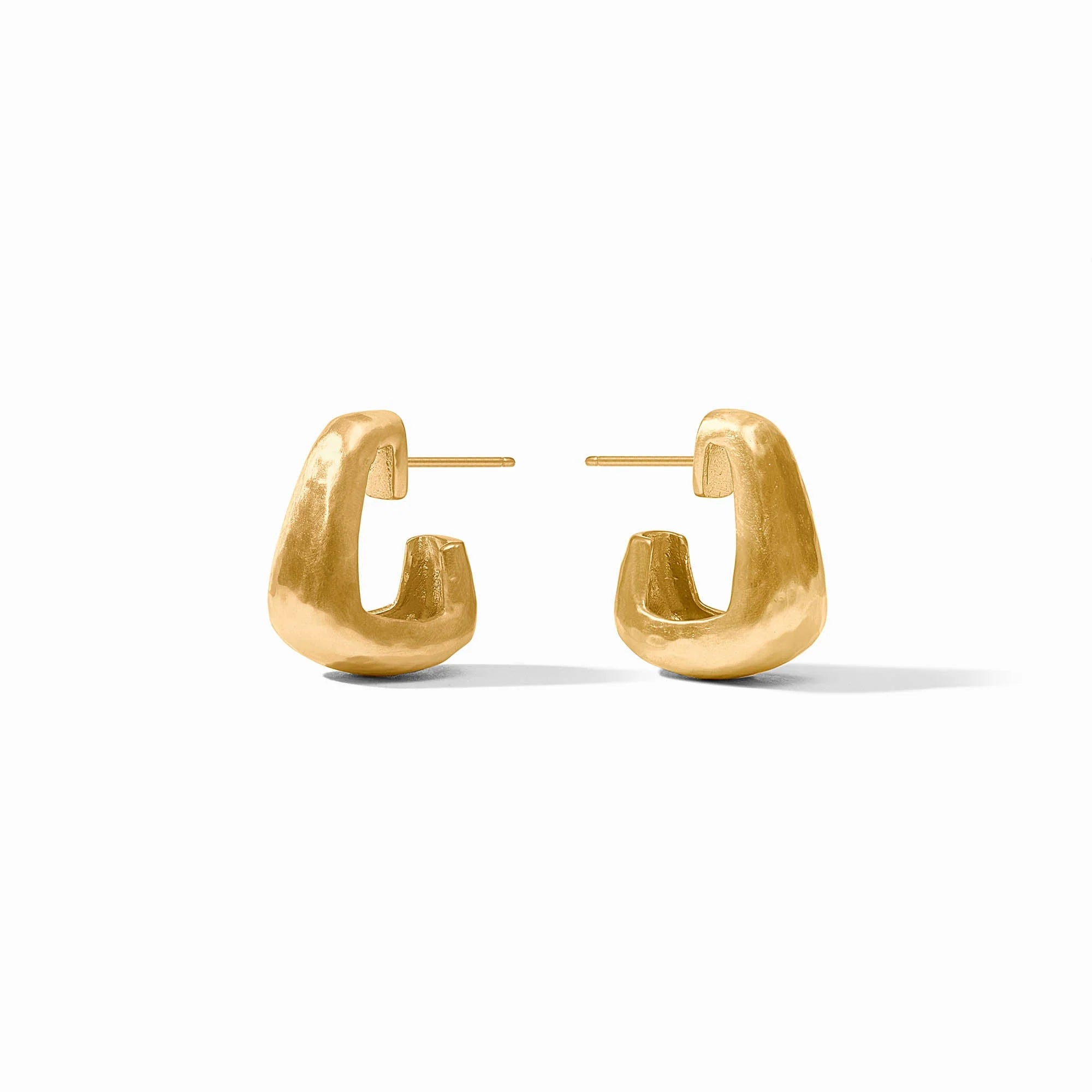 Gold hoop earrings on a white background