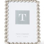 5x7 Silver metallic photo frame featuring a sculptural ball-inspired border and glass front, designed for horizontal or vertical display on a tabletop, shelf, desk, or mantel.