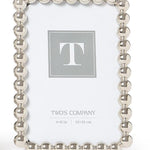 4x6 Silver metallic photo frame featuring a sculptural ball-inspired border and glass front, designed for horizontal or vertical display on a tabletop, shelf, desk, or mantel.