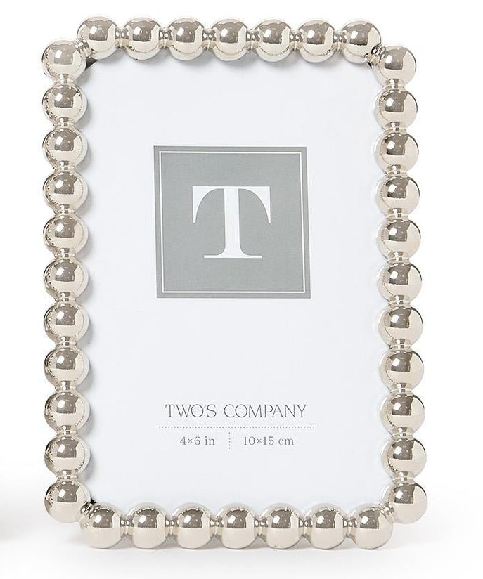 4x6 Silver metallic photo frame featuring a sculptural ball-inspired border and glass front, designed for horizontal or vertical display on a tabletop, shelf, desk, or mantel.
