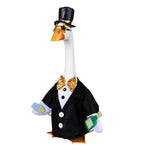 Decorative goose figurine wearing a black suit, bow tie, and top hat on a white background