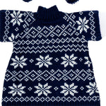 A navy blue and white knit sweater with a classic Fair Isle snowflake and geometric pattern, laid flat against a white background.