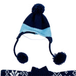 A navy blue and light blue striped knit pom-pom beanie hat with ear flaps and long pom-pom tassels, shown on a white background with a matching navy knit garment partially visible at the bottom.